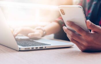 Businessman,At,Workplace,Think,Business,Investment,Plan.contact,Investor,Using,Cell